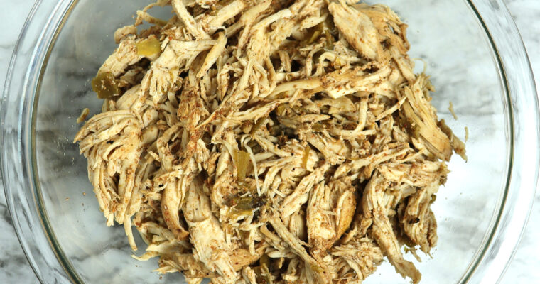 Bowl of Mexican shredded chicken.