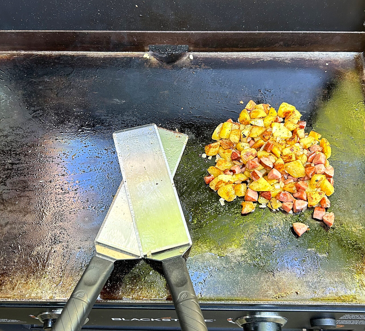 Breakfast hash on the griddle.