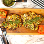 Grilled marinated chicken breast sliced and served with chimichurri.