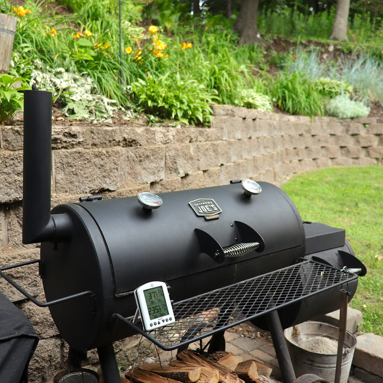 Smoker coming to temperature, setting the stage for a slow and flavorful barbecue journey with a perfectly seasoned pork butt.